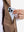 Close-up view of khaki classic micro suede leather puffer vest inner pocket detail