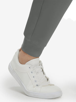 Detail view of hem on iron grey flat front golf joggers pants with belt loops