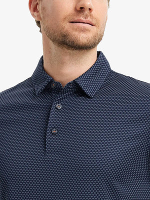 GREY NAVY Your Favorite Jacquard Polo front view from nose to chest of model