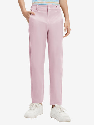 Front lower body shot of model wearing the pink youth water resistant cotton blend golf pants, showcasing a relaxed fit