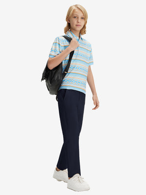 Full-body front view of model wearing the navy youth water resistant cotton blend golf pants for a complete look