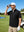 Front upper body angled shot of model wearing black lightweight UPF50+ short sleeve golf vest jacket and using a golf rangefinder