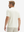 Side-back half-body view of model in cream moisture-wicking short sleeve henley shirt