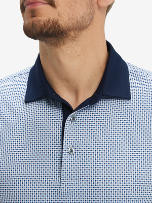 Close-up: nose to chest in light dark blue grafics lightweight stretch upgraded print golf polo shirts