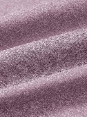 Close-up of dusty rose melange moisture wicking quarter zip pullover fabric texture